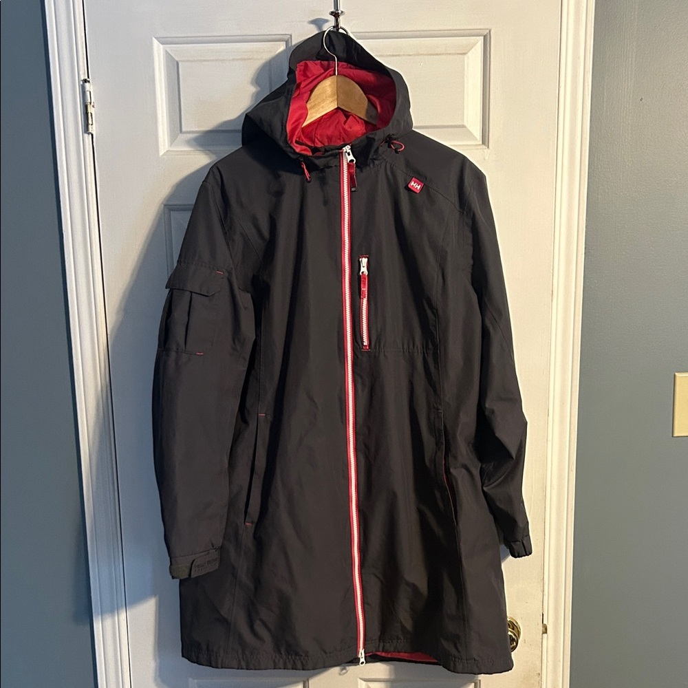 Women’s grey, pink and white Helly Hansen rain jacket